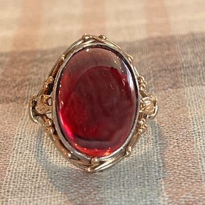 Arts and Crafts Era Large Cabochon Garnet Ring in Silver Gold Accents