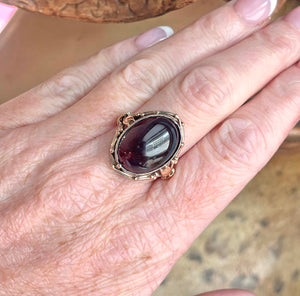 Arts and Crafts Era Large Cabochon Garnet Ring in Silver Gold Accents