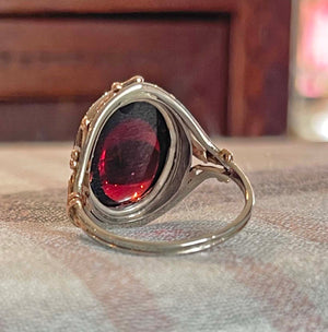 Arts and Crafts Era Large Cabochon Garnet Ring in Silver Gold Accents